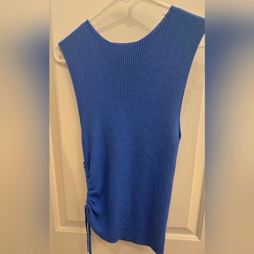 Zara sleeveless knit top with drawstring peephole side, as new.